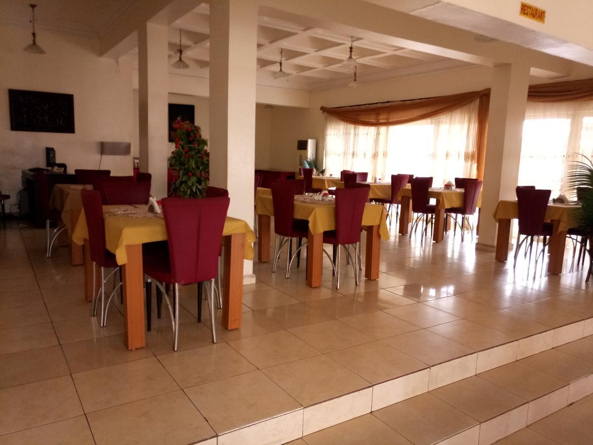 Hotel Benizia Asaba Buitenkant foto
